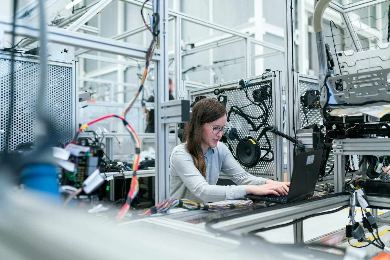 Engineer working on instrument software at a lab workstation